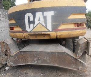 Продаем колесный экскаватор Caterpillar M315, 0,8 м3, 2001 г.в. - <ro>Изображение</ro><ru>Изображение</ru> #6, <ru>Объявление</ru> #1590112